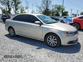2013 Volkswagen Jetta SE z VIN 3VWDX7AJXDM235339, wystawiony jako Copart lot #52751345 z przebiegiem 143 478 mil mil oraz Szkoda całkowita • Salvage title. Historia ofert i sprzedaży dostępna na DreamBid. Obrazek 4.