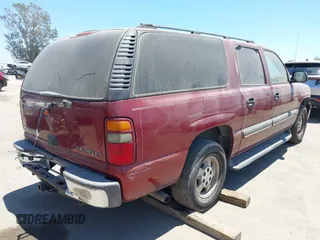 2003 Chevrolet Suburban LT z VIN 1GNEC16Z23J218746, wystawiony jako IAAI lot #42528186 z przebiegiem 132 078 mil mil oraz . Historia ofert i sprzedaży dostępna na DreamBid. Obrazek 4.