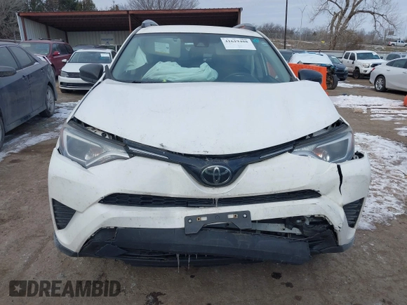2017 Toyota RAV4 LE with VIN JTMBFREV4HJ170495, listed as a IAAI auction lot 41619488 with 132,751 mi miles and . Bid and sale history available at DreamBid. Image 12.
