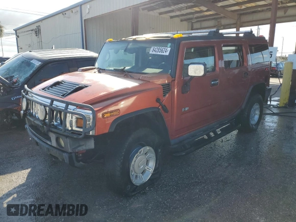 2003 Hummer H2 with VIN 5GRGN23U73H141713, listed as a Copart auction lot 84285624 with 152,719 mi miles and Non Repairable. Bid and sale history available at carsss.com. Image 1.