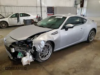 2016 Subaru BRZ Limited z VIN JF1ZCAC14G9601299, wystawiony jako Copart lot #58822965 z przebiegiem 141 066 mil mil oraz Szkoda całkowita • Salvage title. Historia ofert i sprzedaży dostępna na DreamBid. Obrazek 1.