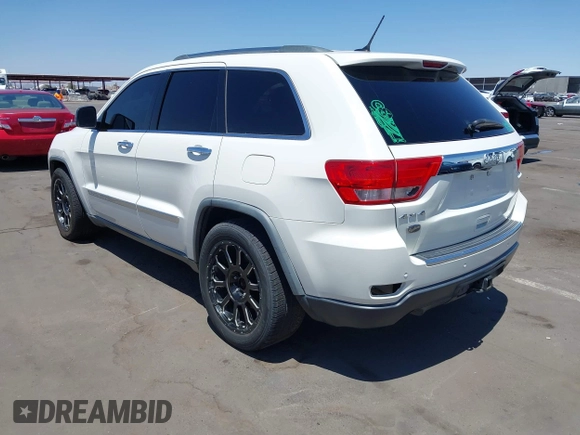 2011 Jeep Grand Cherokee Overland with VIN 1J4RR6GT2BC647589, listed as a IAAI auction lot 42603134 with 153,570 mi miles and . Bid and sale history available at DreamBid. Image 3.