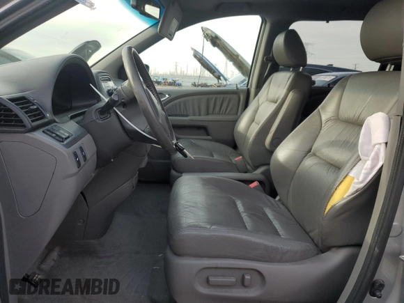2010 Honda Odyssey EX-L with VIN 5FNRL3H69AB001952, listed as a Copart auction lot 49738155 with 95,721 mi miles and Salvage Title. Bid and sale history available at carsss.com. Image 7.