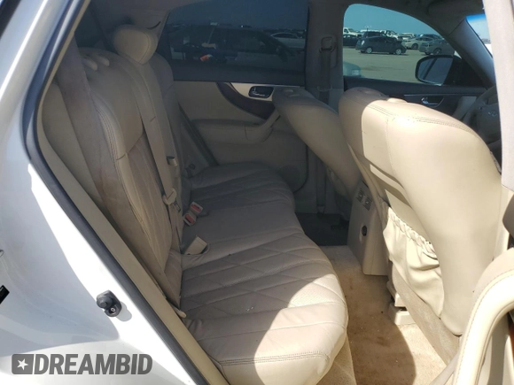 2012 Infiniti FX with VIN JN8AS1MW7CM152071, listed as a Copart auction lot 52519145 with 148,657 mi miles and Salvage title. Bid and sale history available at DreamBid. Image 10.