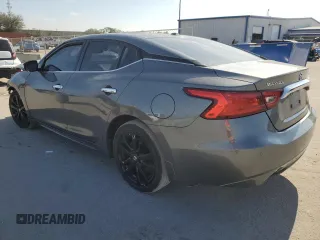 2016 Nissan Maxima S с VIN 1N4AA6AP9GC430964, выставлен на аукционе Copart как лот 85406374 с пробегом 143 020 миль миль и Списание • Salvage title. История ставок и продаж доступна на DreamBid. Изображение 2.