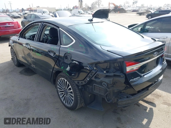 2018 Ford Fusion Titanium with VIN 3FA6P0RU6JR115236, listed as a IAAI auction lot 42111343 with 106,858 mi miles and . Bid and sale history available at DreamBid. Image 3.