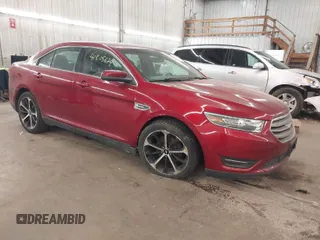 2016 Ford Taurus SEL z VIN 1FAHP2E88GG129300, wystawiony jako IAAI lot #41805674 z przebiegiem 121 741 mil mil oraz . Historia ofert i sprzedaży dostępna na DreamBid. Obrazek 1.