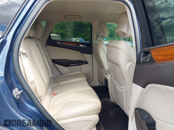 2018 Lincoln MKC Select with VIN 5LMCJ2C99JUL04561, listed as a IAAI auction lot 42210434 with 102,746 mi miles and . Bid and sale history available at DreamBid. Image 8.