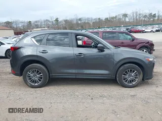 2021 Mazda CX-5 Touring with VIN JM3KFBCM8M0492145, listed as a IAAI auction lot 39077248 with 20,408 mi miles. Bid and sale history available at carsss.com. Image 13.