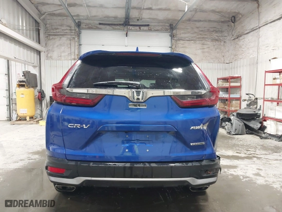 2021 Honda CR-V Touring with VIN 7FARW2H95ME000026, listed as a IAAI auction lot 41550612 with 22,037 mi miles. Bid and sale history available at carsss.com. Image 17.