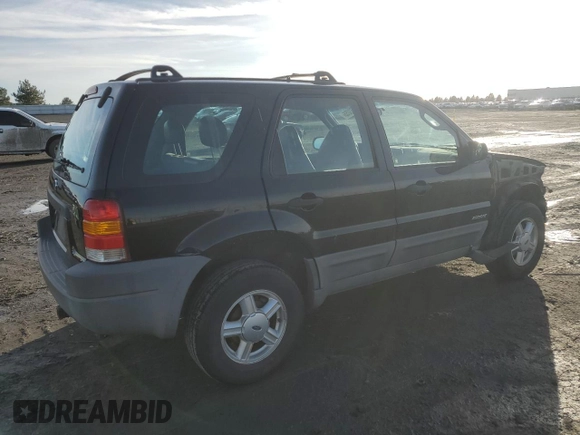 2001 Ford Escape XLS with VIN 1FMYU02101KE82516, listed as a Copart auction lot 46163255 with 190,989 mi miles and Salvage Title. Bid and sale history available at carsss.com. Image 3.