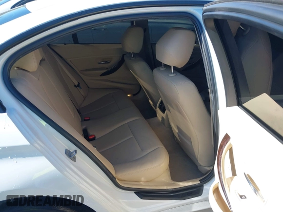 2015 BMW 3 Series 320i with VIN WBA3B1G57FNT02019, listed as a IAAI auction lot 42128277 with 218,621 mi miles and . Bid and sale history available at DreamBid. Image 8.