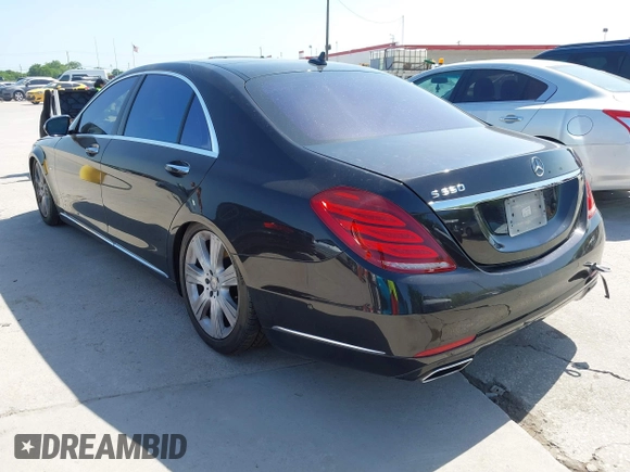 2014 Mercedes-Benz S-Class S 550 with VIN WDDUG8CB9EA009280, listed as a IAAI auction lot 42001730 with 217,213 mi miles. Bid and sale history available at carsss.com. Image 3.