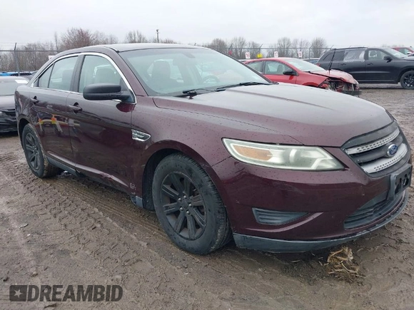2011 Ford Taurus SE with VIN 1FAHP2DW7BG136988, listed as a IAAI auction lot 42002512 with 145,847 mi miles. Bid and sale history available at carsss.com. Image 1.