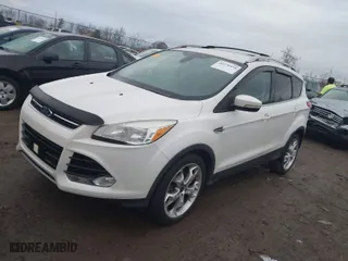 2015 Ford Escape Titanium with VIN 1FMCU9J95FUB91253, listed as a IAAI auction lot 40776894 with 146,855 mi miles. Bid and sale history available at carsss.com. Image 2.