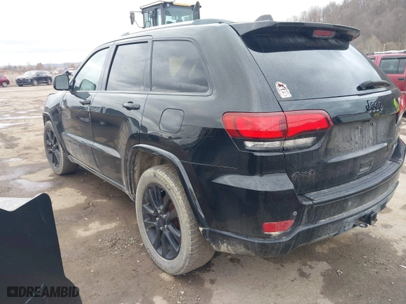 2018 Jeep Grand Cherokee Laredo E with VIN 1C4RJFAG3JC324434, listed as a IAAI auction lot 41812311 with 140,820 mi miles. Bid and sale history available at carsss.com. Image 3.
