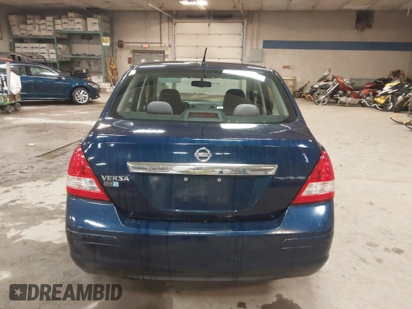 2009 Nissan Versa 1.8 S with VIN 3N1BC11E79L440560, listed as a IAAI auction lot 41975289 with 158,726 mi miles. Bid and sale history available at carsss.com. Image 15.