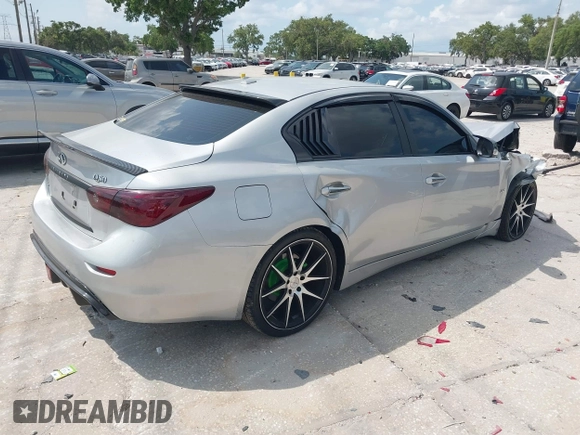 2014 Infiniti Q50 Sport с VIN JN1BV7ARXEM694019, выставлен на аукционе IAAI как лот 42182390 с пробегом 65 904 миль миль и . История ставок и продаж доступна на DreamBid. Изображение 4.