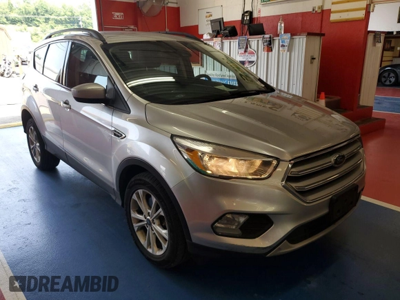 2018 Ford Escape SE z VIN 1FMCU9GD3JUC13075, wystawiony jako IAAI lot #42537659 z przebiegiem 77 270 mil mil oraz . Historia ofert i sprzedaży dostępna na DreamBid. Obrazek 28.
