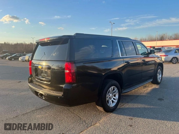 2015 Chevrolet Suburban with VIN 1GNSKHEC4FR25217, listed as a Copart auction lot 65346775 with 213,363 mi miles and Clean title. Bid and sale history available at DreamBid. Image 4.