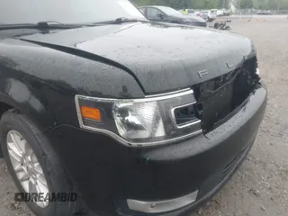 2014 Ford Flex SEL z VIN 2FMHK6C89EBD00168, wystawiony jako IAAI lot #42289106 z przebiegiem 158 598 mil mil oraz . Historia ofert i sprzedaży dostępna na DreamBid. Obrazek 17.