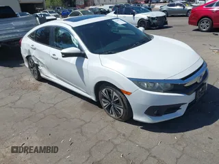 2016 Honda Civic EX-L with VIN 2HGFC1F73GH650041, listed as a IAAI auction lot 42688744 with 132,584 mi miles and . Bid and sale history available at DreamBid. Image 1.