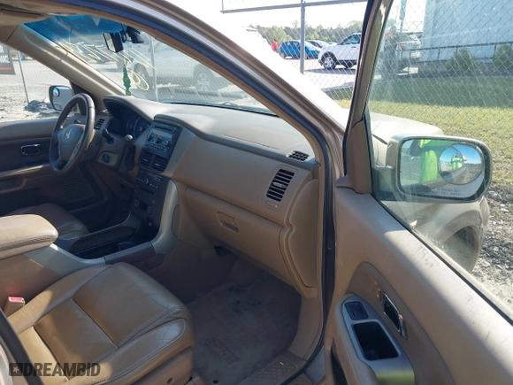 2006 Honda Pilot EX-L with RES with VIN 2HKYF186X6H525613, listed as a IAAI auction lot 42077659 with 171,124 mi miles. Bid and sale history available at carsss.com. Image 5.