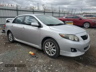 2010 Toyota Corolla with VIN 1NXBU4EE1AZ377581, listed as a Copart auction lot 52578805 with 242,776 mi miles and Salvage Title. Bid and sale history available at DreamBid. Image 4.