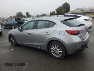 2014 Mazda 3 i Grand Touring with VIN JM1BM1M74E1106463, listed as a Copart auction lot 85144434 with 122,729 mi miles and Salvage Title. Bid and sale history available at DreamBid. Image 2.