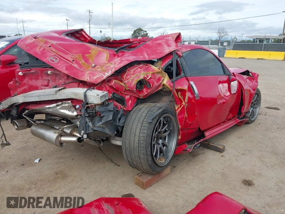 2003 Nissan 350Z Touring with VIN JN1AZ34E13T009880, listed as a IAAI auction lot 41652325 with 1 mi miles. Bid and sale history available at carsss.com. Image 4.
