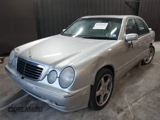 2002 Mercedes-Benz E-Class with VIN WDBJF82J52X062526, listed as a IAAI auction lot 41192641 with 126,352 mi miles. Bid and sale history available at carsss.com. Image 2.