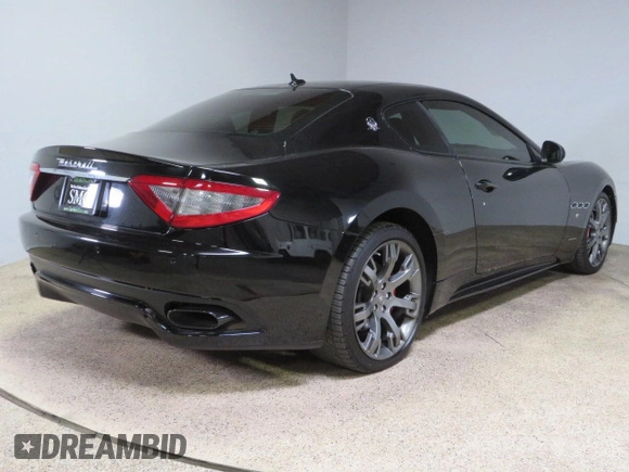 2013 Maserati GranTurismo Sport с VIN ZAM45VLAXD0072023, выставлен на аукционе Copart как лот 78521144 с пробегом 86 008 миль миль и Списание • Salvage title. История ставок и продаж доступна на DreamBid. Изображение 3.