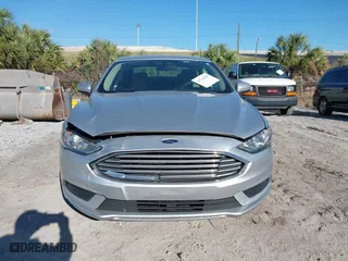 2018 Ford Fusion Hybrid S with VIN 3FA6P0UU8JR244912, listed as a IAAI auction lot 41742940 with 65,885 mi miles. Bid and sale history available at carsss.com. Image 12.
