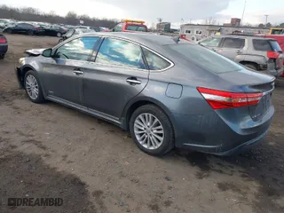 2015 Toyota Avalon Hybrid XLE Touring with VIN 4T1BD1EB2FU042051, listed as a IAAI auction lot 41346573 with 99,324 mi miles. Bid and sale history available at carsss.com. Image 3.