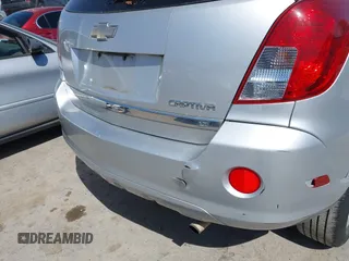 2013 Chevrolet Captiva Sport LT z VIN 3GNAL3EK5DS637043, wystawiony jako IAAI lot #42089008 z przebiegiem 170 556 mil mil oraz . Historia ofert i sprzedaży dostępna na DreamBid. Obrazek 12.