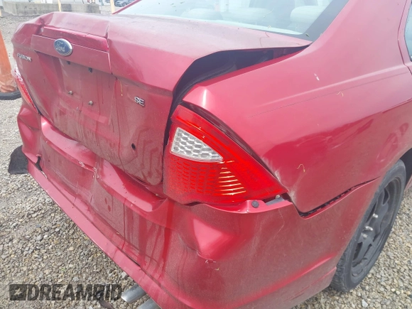 2010 Ford Fusion SE with VIN 3FAHP0HA6AR303870, listed as a IAAI auction lot 42142147 with 187,522 mi miles and . Bid and sale history available at DreamBid. Image 14.