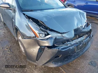 2020 Toyota Prius L Eco with VIN JTDKARFU3L3111231, listed as a IAAI auction lot 41398103 with 181,134 mi miles and . Bid and sale history available at DreamBid. Image 6.