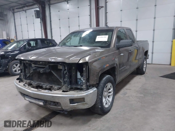 2014 Chevrolet Silverado 1500 LT with VIN 1GCVKREC9EZ240612, listed as a IAAI auction lot 41108566 with 200,625 mi miles and . Bid and sale history available at DreamBid. Image 18.