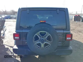 2018 Jeep Wrangler Unlimited Sport S with VIN 1C4HJXDN0JW255003, listed as a IAAI auction lot 41528394 with 55,660 mi miles and . Bid and sale history available at DreamBid. Image 17.