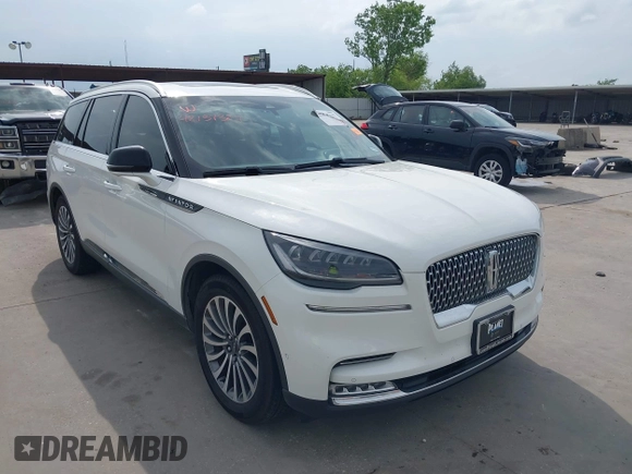 2020 Lincoln Aviator Reserve with VIN 5LM5J7WC1LGL28593, listed as a IAAI auction lot 42137327 with 83,114 mi miles and . Bid and sale history available at DreamBid. Image 1.