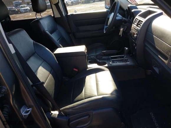 2011 Dodge Nitro Heat with VIN 1D4PU4GX9BW607188, listed as a IAAI auction lot 41100616 with 86,062 mi miles. Bid and sale history available at carsss.com. Image 5.