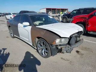 2012 Dodge Charger Police with VIN 2C3CDXAT8CH221109, listed as a IAAI auction lot 41792669 with 188,698 mi miles. Bid and sale history available at carsss.com. Image 1.