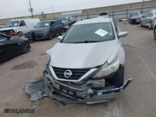 2017 Nissan Altima 2.5 SR with VIN 1N4AL3AP6HC293878, listed as a IAAI auction lot 41582060 with 154,542 mi miles. Bid and sale history available at carsss.com. Image 12.