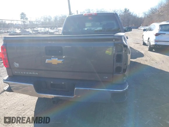 2014 Chevrolet Silverado 1500 LT with VIN 1GCVKREC9EZ300548, listed as a IAAI auction lot 41318981 with 237,113 mi miles and . Bid and sale history available at DreamBid. Image 17.