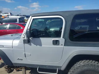 2004 Jeep Wrangler Rubicon with VIN 1J4FA69S94P701660, listed as a IAAI auction lot 41699554 with 74,640 mi miles. Bid and sale history available at carsss.com. Image 15.