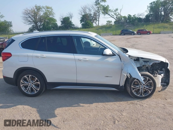 2016 BMW X1 xDrive28i z VIN WBXHT3Z37G4A48242, wystawiony jako IAAI lot #42473404 z przebiegiem 34 309 mil mil oraz . Historia ofert i sprzedaży dostępna na DreamBid. Obrazek 14.