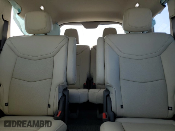 2021 Cadillac XT6 Premium Luxury z VIN 1GYKPCRS6MZ205831, wystawiony jako Copart lot #47259215 z przebiegiem 31 959 mil mil oraz Szkody całkowita. Historia ofert i sprzedaży dostępna na DreamBid. Obrazek 10.
