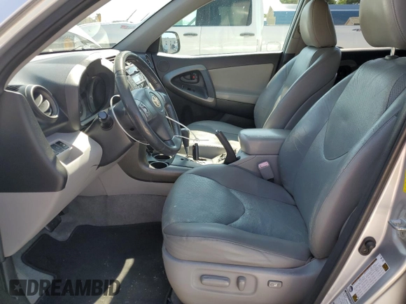 2010 Toyota RAV4 Limited with VIN JTMDK4DV7AD010334, listed as a Copart auction lot 60308555 with 169,321 mi miles and Salvage title. Bid and sale history available at DreamBid. Image 7.