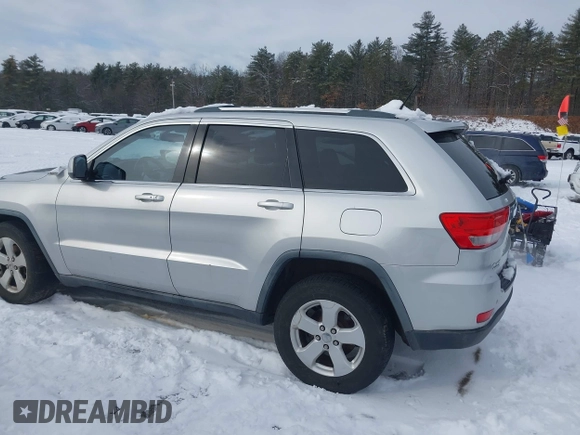 2011 Jeep Grand Cherokee 70th Anniversary with VIN 1J4RR4GGXBC609633, listed as a IAAI auction lot 41469526 with 138,439 mi miles. Bid and sale history available at carsss.com. Image 14.