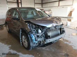 2015 Honda CR-V EX with VIN 3CZRM3H57FG706605, listed as a IAAI auction lot 41233942 with 112,842 mi miles. Bid and sale history available at carsss.com. Image 1.